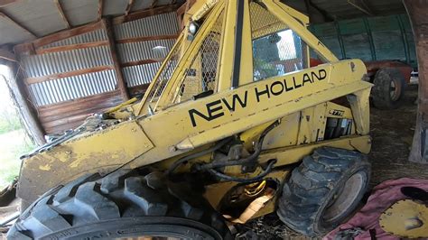 new holland skid steer removal